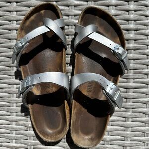 Adorable silver slip on Birkenstocks